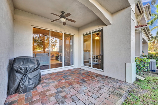 view of patio / terrace featuring central AC, ceiling fan, and a grill