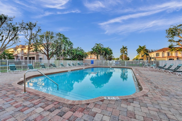 view of swimming pool with a patio