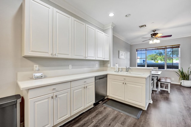 kitchen with dishwasher, crown molding, sink, ceiling fan, and kitchen peninsula