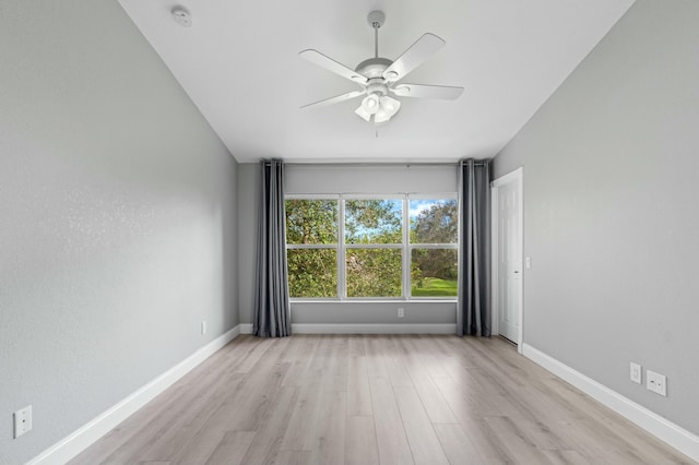 spare room featuring ceiling fan and light wood-type flooring