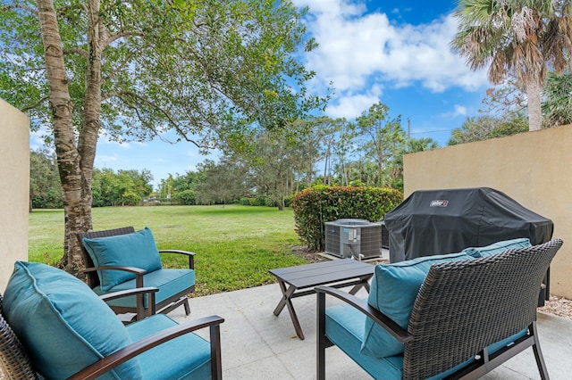 view of patio featuring an outdoor living space, central air condition unit, and grilling area