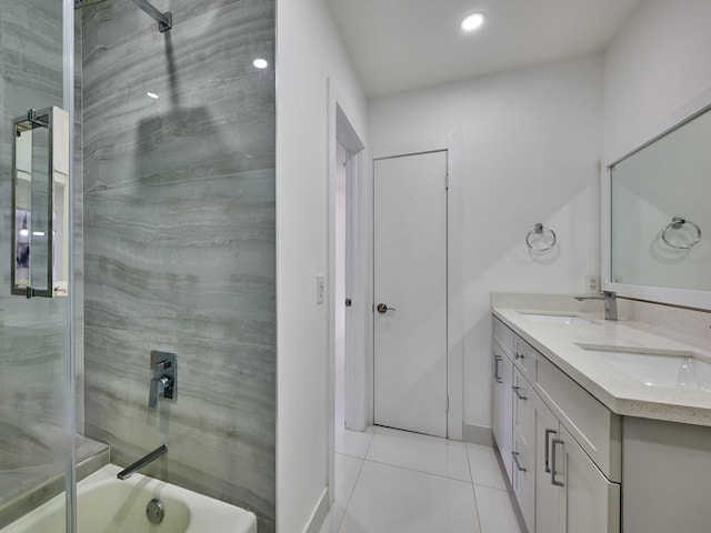 bathroom with vanity, tile patterned floors, and shower / bathtub combination