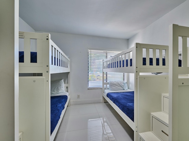 unfurnished bedroom featuring light tile patterned floors