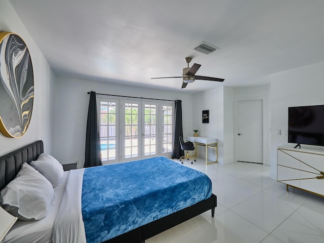 bedroom featuring ceiling fan, light tile patterned flooring, and french doors