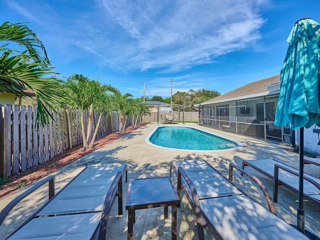 view of swimming pool featuring a patio