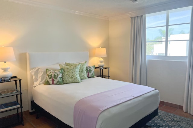 bedroom with ornamental molding