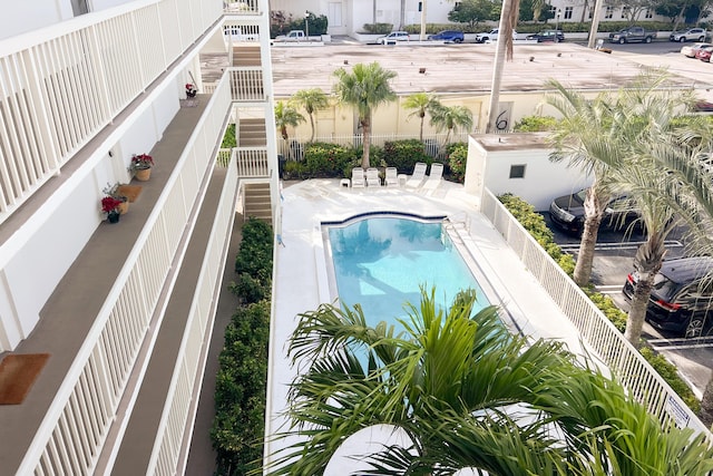 view of swimming pool with a patio area