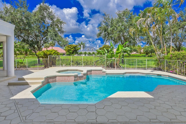 view of pool featuring an in ground hot tub and a patio