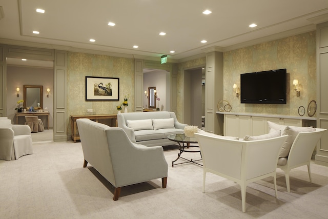 living room featuring light colored carpet and ornamental molding