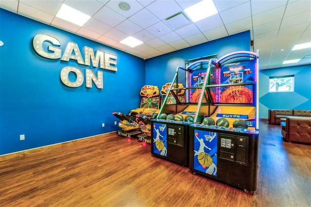 game room with hardwood / wood-style floors