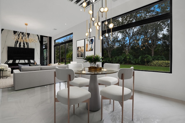 dining area featuring an inviting chandelier