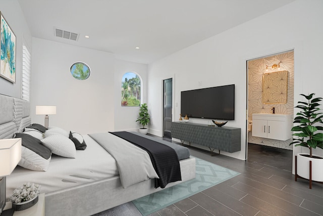 bedroom featuring dark hardwood / wood-style flooring