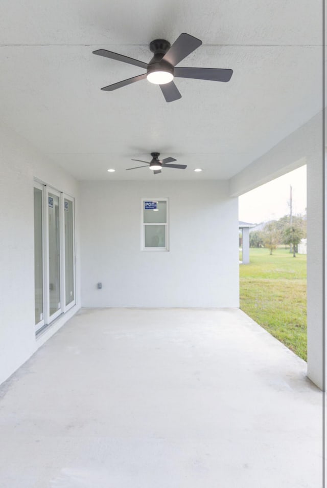 view of patio / terrace featuring ceiling fan