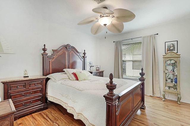 bedroom featuring a ceiling fan and light wood-style flooring