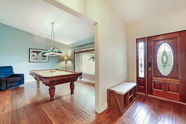 entryway featuring lofted ceiling, pool table, baseboards, and hardwood / wood-style flooring