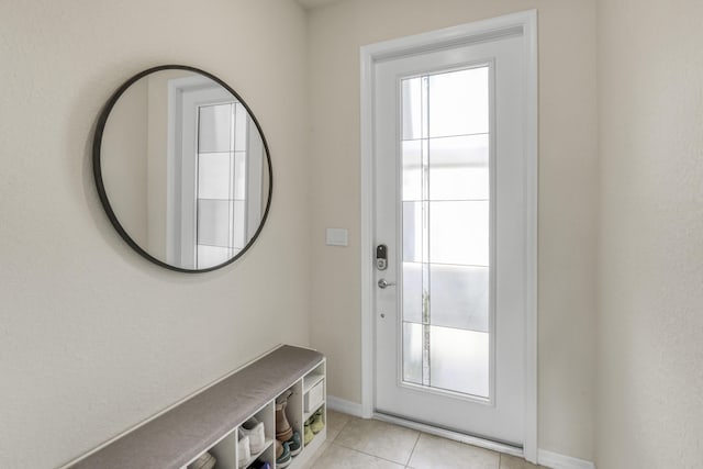 doorway featuring light tile patterned floors