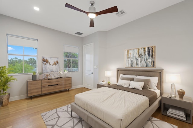 bedroom featuring ceiling fan and light wood-type flooring