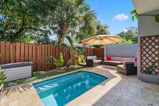 view of swimming pool featuring outdoor lounge area and a patio