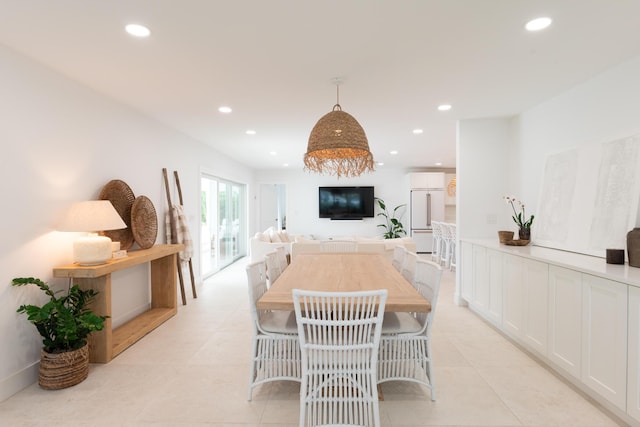 view of tiled dining space