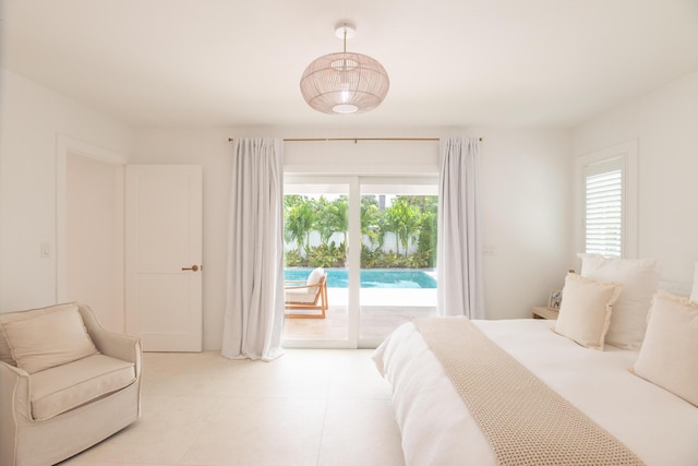 bedroom featuring access to outside and multiple windows