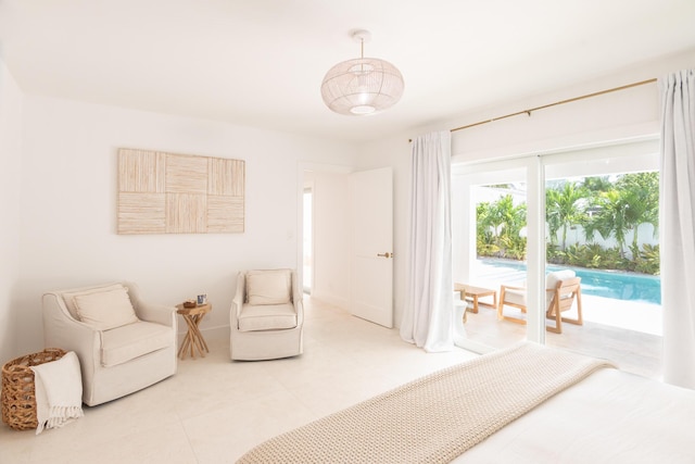 tiled bedroom with access to exterior