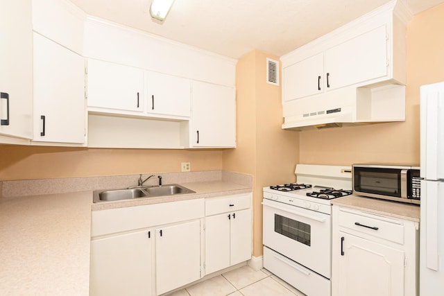 kitchen featuring ornamental molding, white appliances, sink, white cabinets, and light tile patterned flooring