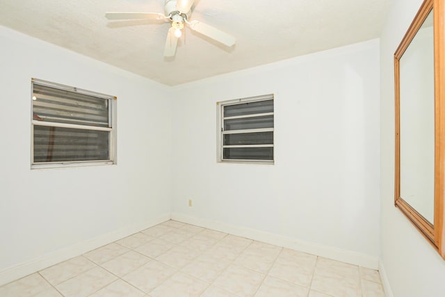 empty room featuring ceiling fan