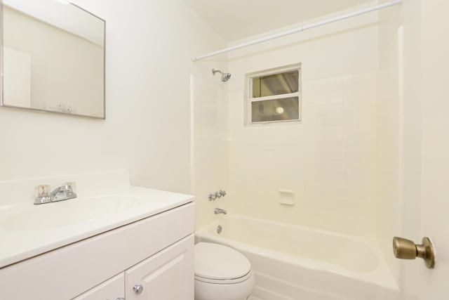 full bathroom featuring toilet, vanity, and washtub / shower combination