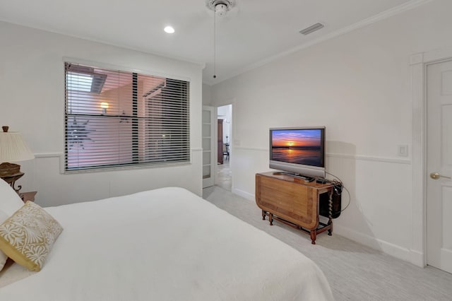 carpeted bedroom featuring ornamental molding