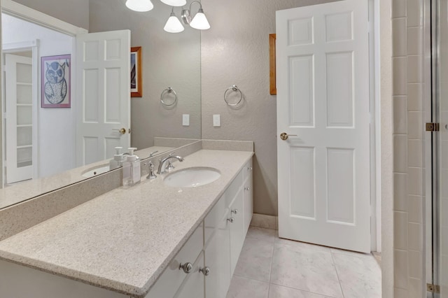 bathroom featuring tile patterned floors and vanity