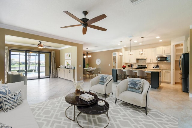 living room featuring light tile patterned floors, ceiling fan, and ornamental molding