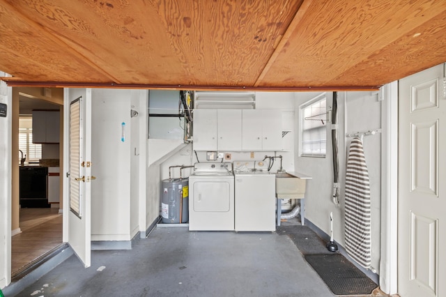 garage with washer and clothes dryer, electric panel, and a garage door opener