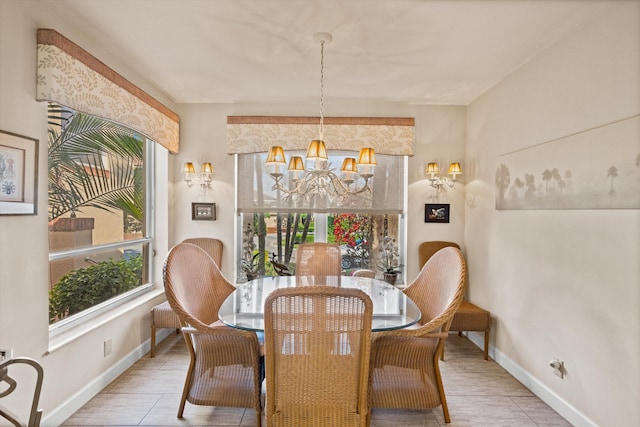 dining area featuring a chandelier