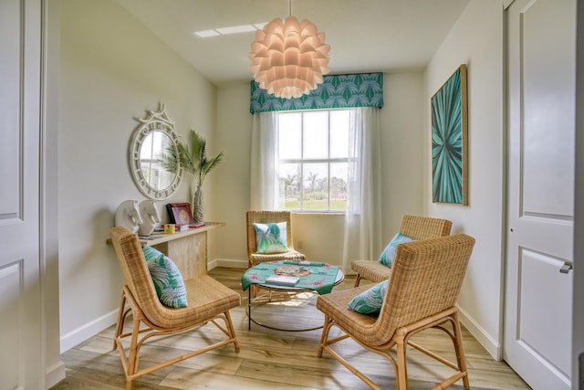 sitting room with light hardwood / wood-style floors