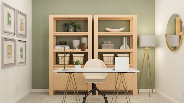 carpeted home office featuring baseboards