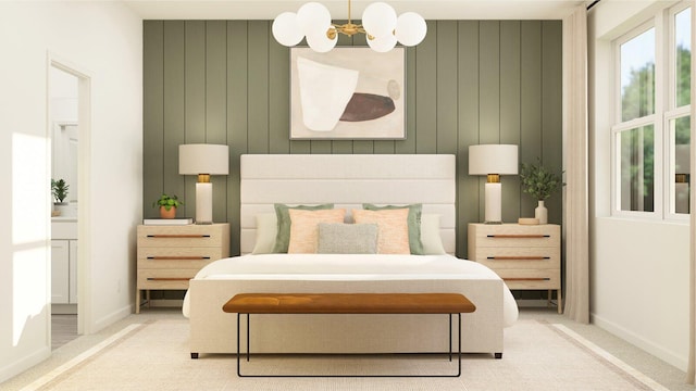 carpeted bedroom with baseboards, a notable chandelier, and connected bathroom