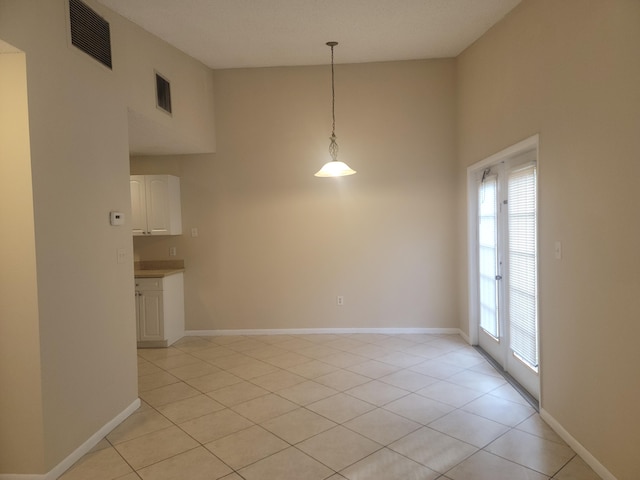 view of tiled spare room