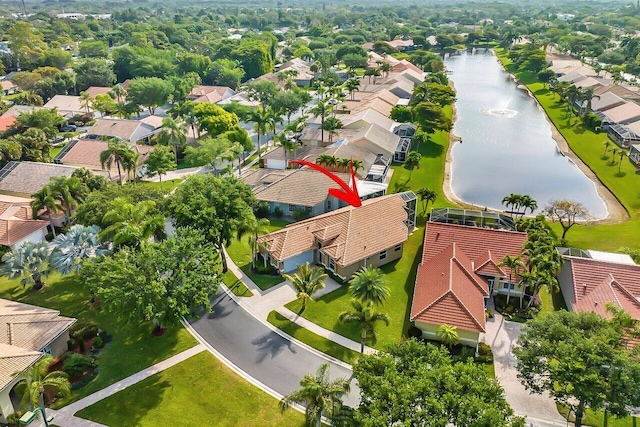 bird's eye view with a water view