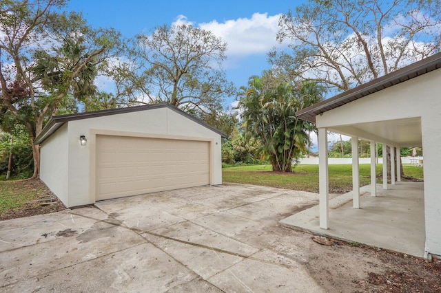 garage with a yard