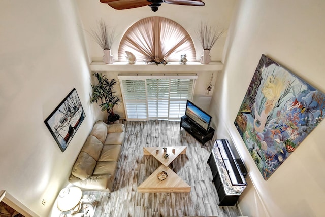 living room featuring ceiling fan