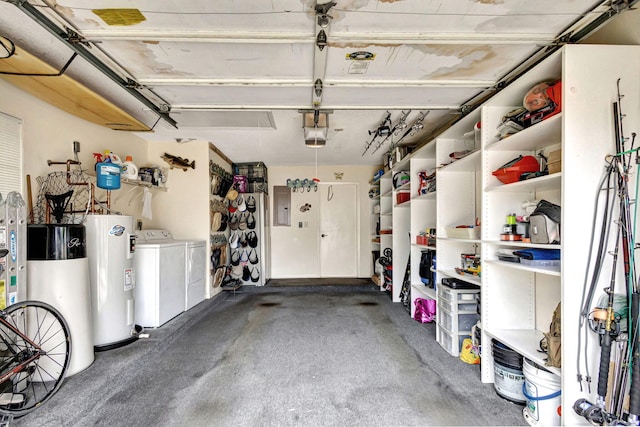 garage with washer and clothes dryer, gas water heater, electric water heater, and electric panel