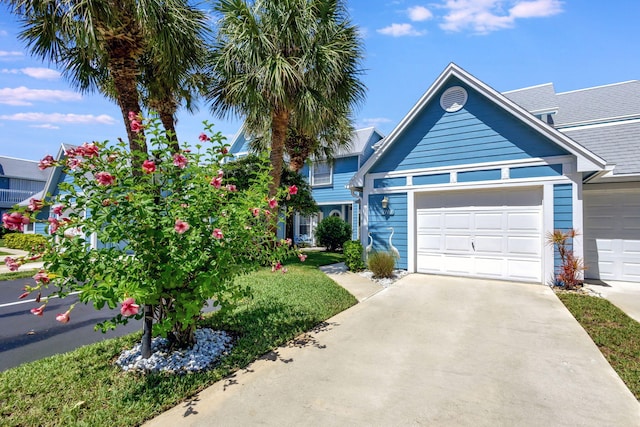 view of front of property with a garage