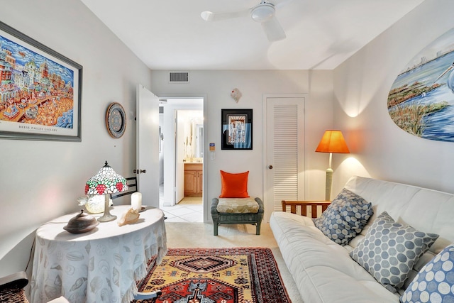 living room featuring ceiling fan