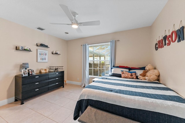 bedroom featuring ceiling fan and light tile patterned flooring