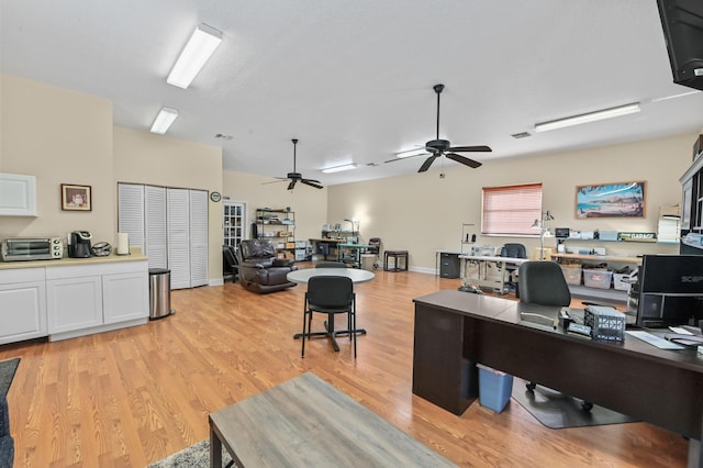 home office with light wood-type flooring