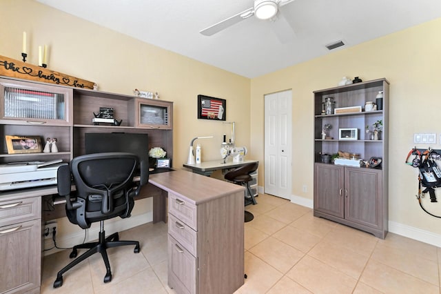 office area featuring ceiling fan and light tile patterned floors