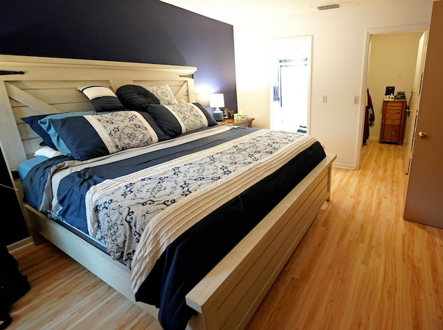 bedroom featuring light hardwood / wood-style floors