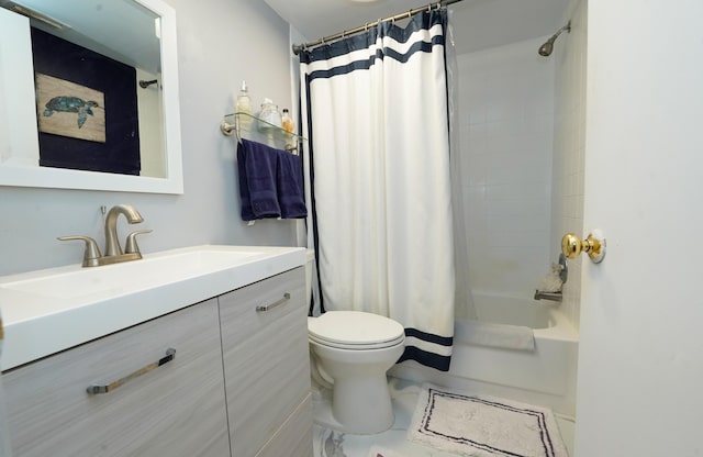 full bathroom with shower / bath combo, marble finish floor, vanity, and toilet