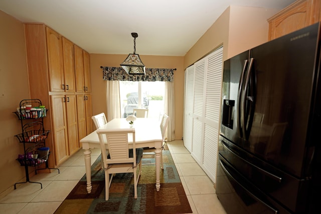 dining space with light tile patterned flooring