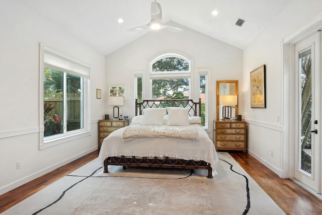 bedroom with lofted ceiling, hardwood / wood-style floors, and ceiling fan